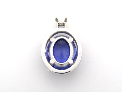 18K gold tanzanite and diamond pendant.
