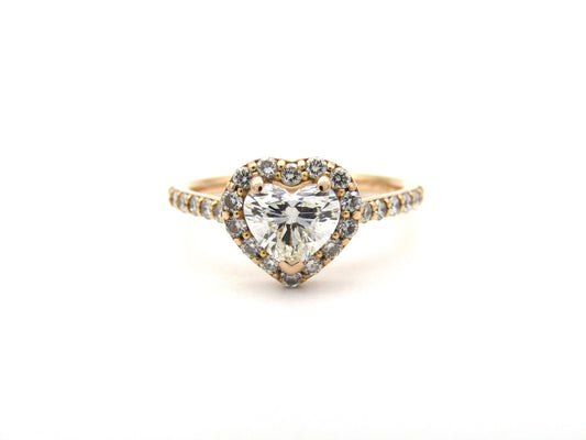 18K gold heart-shaped diamond halo ring.