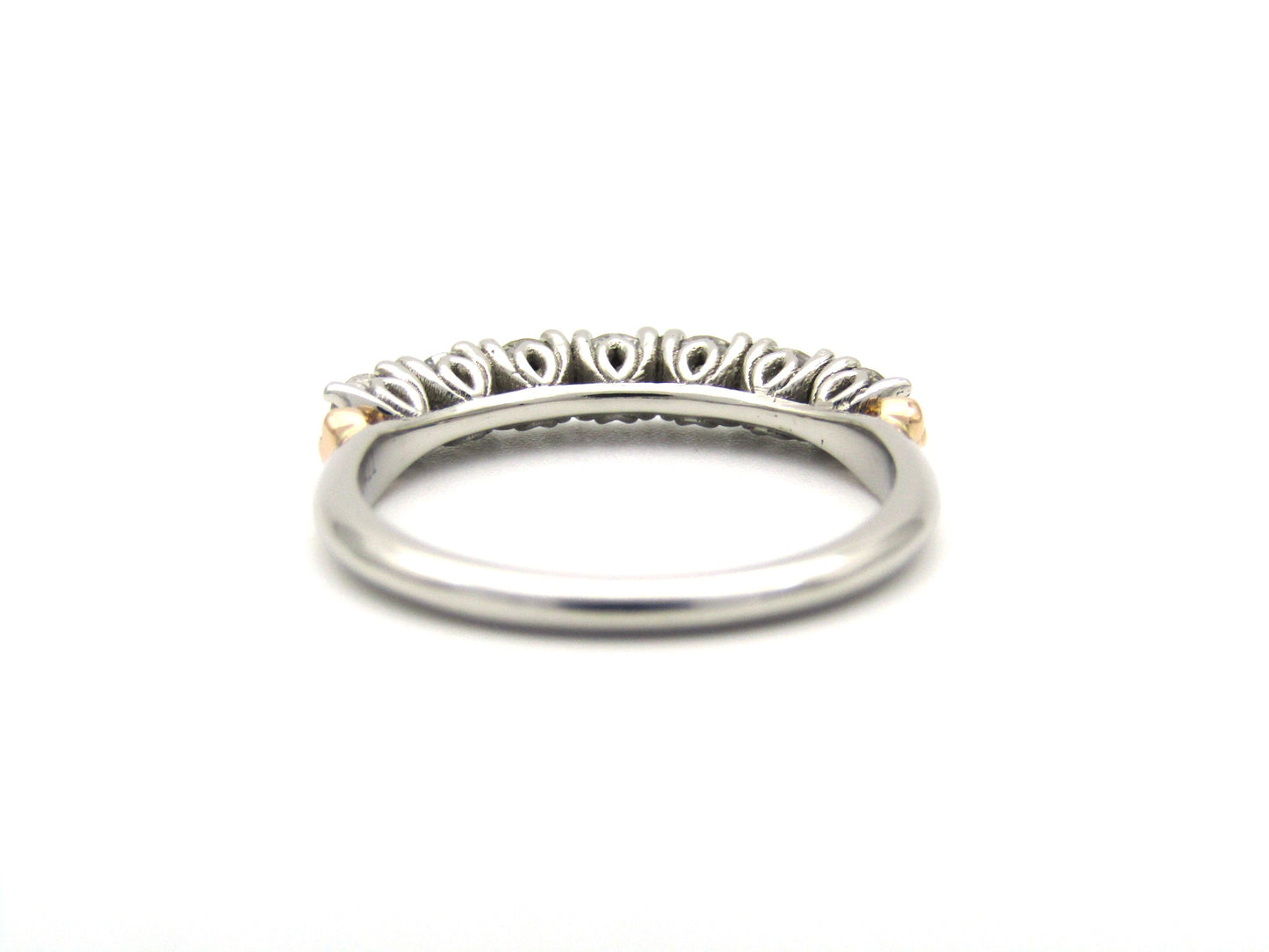 Platinum and 18K gold diamond Protea half eternity ring by Browns.