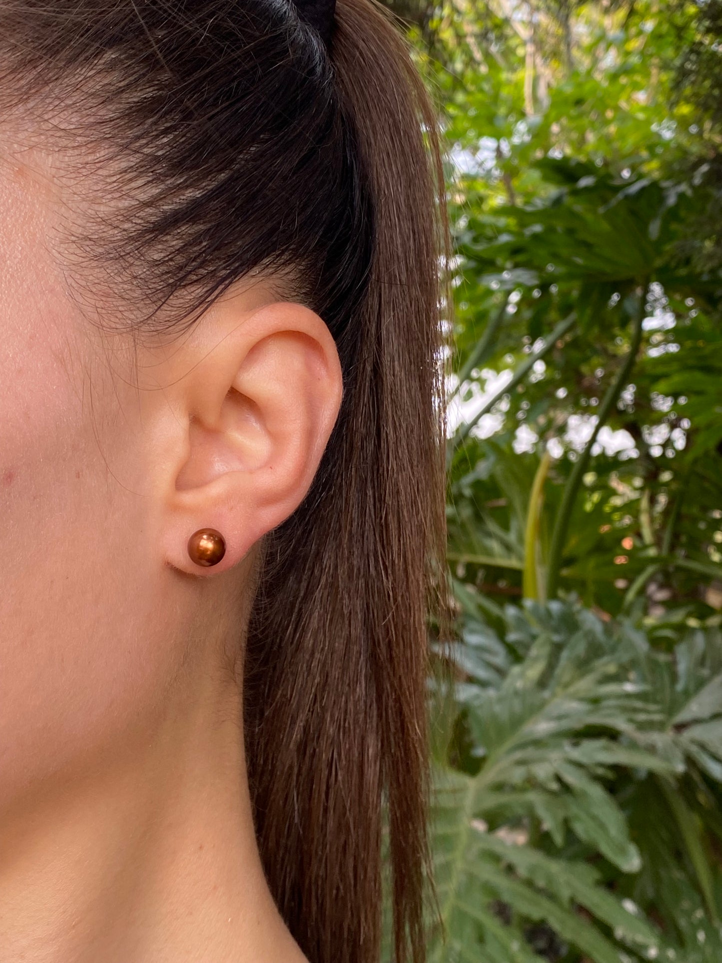 9K gold Akoya pearl stud earrings.