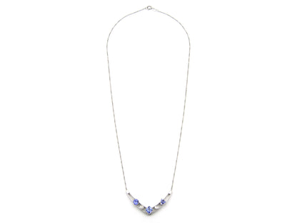 18K gold tanzanite and diamond necklace.