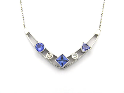 18K gold tanzanite and diamond necklace.