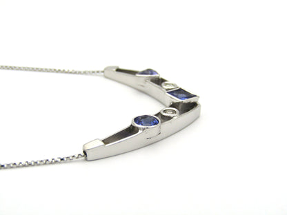 18K gold tanzanite and diamond necklace.