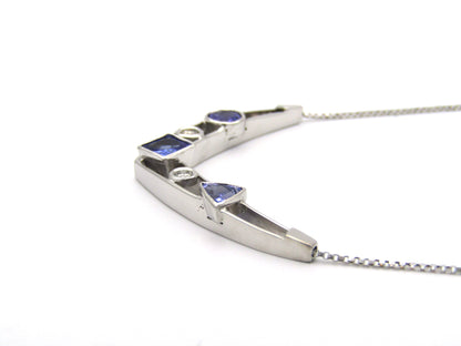 18K gold tanzanite and diamond necklace.