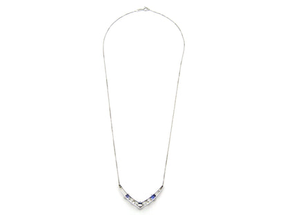 18K gold tanzanite and diamond necklace.