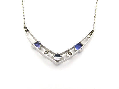 18K gold tanzanite and diamond necklace.