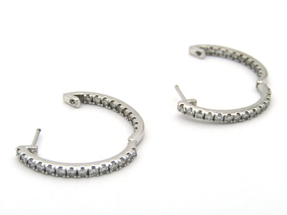 18K gold diamond hoop earrings by Browns.