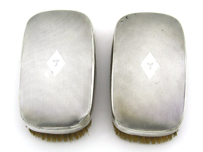 A pair of silver clothes brushes by Charles Packer & Co, London, 1929.