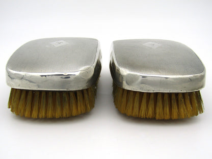 A pair of silver clothes brushes by Charles Packer & Co, London, 1929.