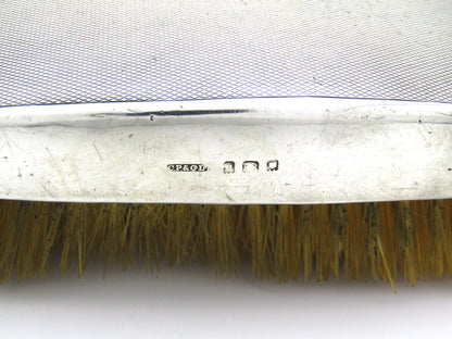 A pair of silver clothes brushes by Charles Packer & Co, London, 1929.