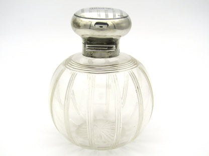 Silver-topped scent bottle by Mappin & Webb, London, 1915.
