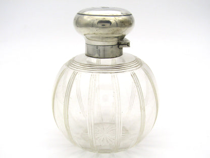 Silver-topped scent bottle by Mappin & Webb, London, 1915.