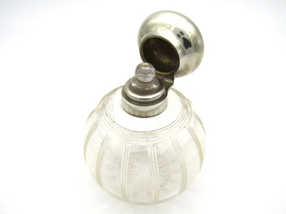 Silver-topped scent bottle by Mappin & Webb, London, 1915.
