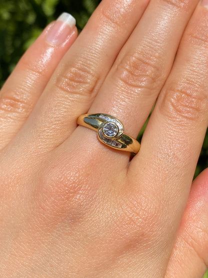 18K gold diamond ring, circa 1970's.