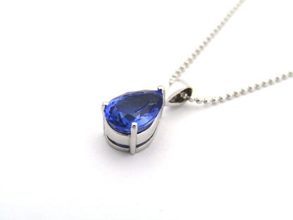 18K gold tanzanite pendant with 18K gold chain.