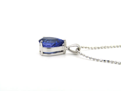 18K gold tanzanite pendant with 18K gold chain.