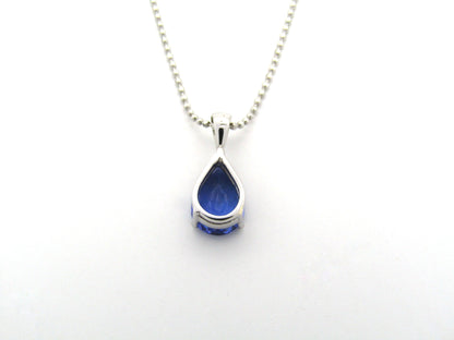 18K gold tanzanite pendant with 18K gold chain.