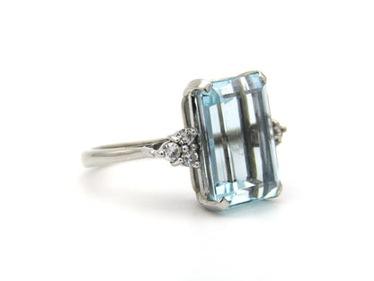 18K gold aquamarine and diamond ring, London, 1973.