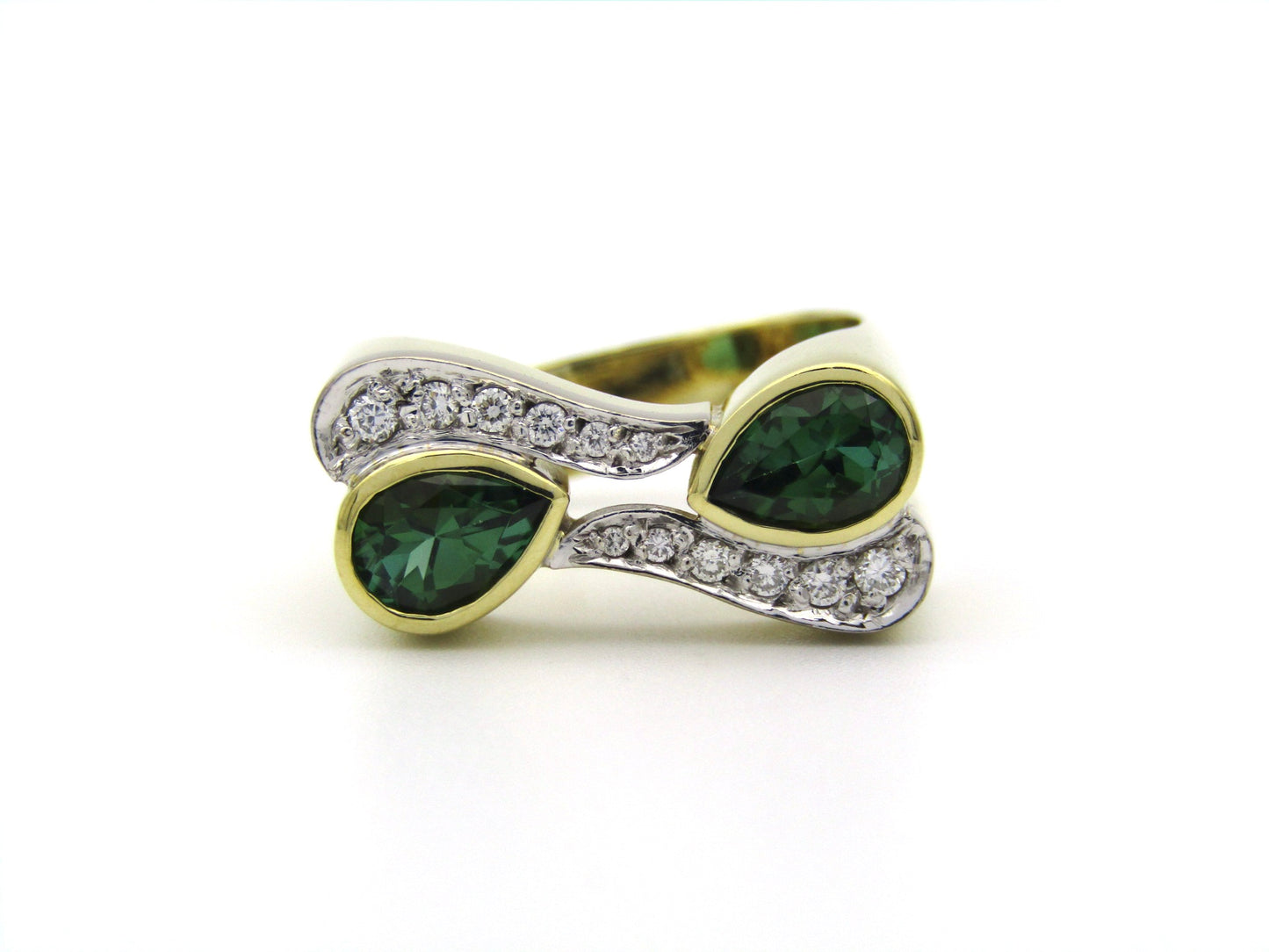 18K gold tourmaline and diamond ring by Uwe Koetter, circa 1990.