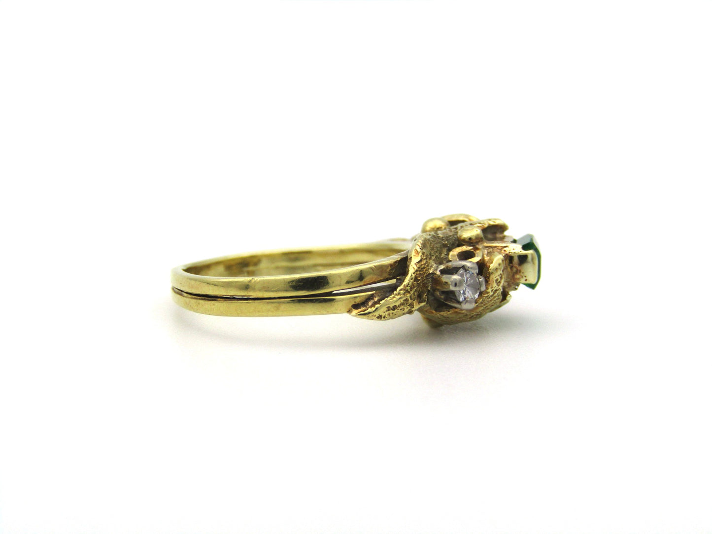 18K gold emerald and diamond ring, circa 1940's.