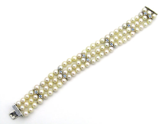 18K gold three-strand akoya cultured pearl bracelet, circa 1980's.