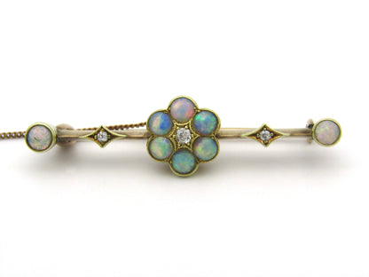 Edwardian 9K gold opal and diamond bar brooch, Circa 1905.