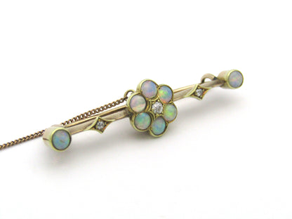 Edwardian 9K gold opal and diamond bar brooch, Circa 1905.