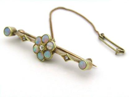 Edwardian 9K gold opal and diamond bar brooch, Circa 1905.