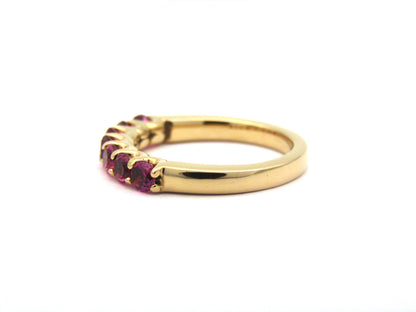 18K gold pink tourmaline half eternity ring.