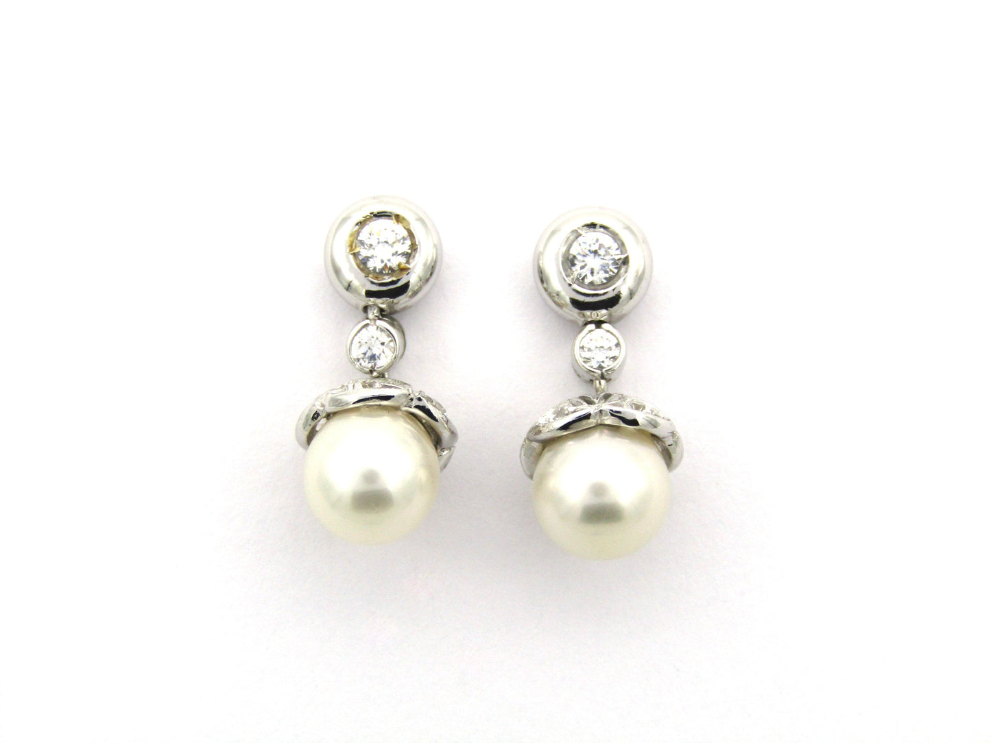 18K gold Akoya pearl and CZ earrings.
