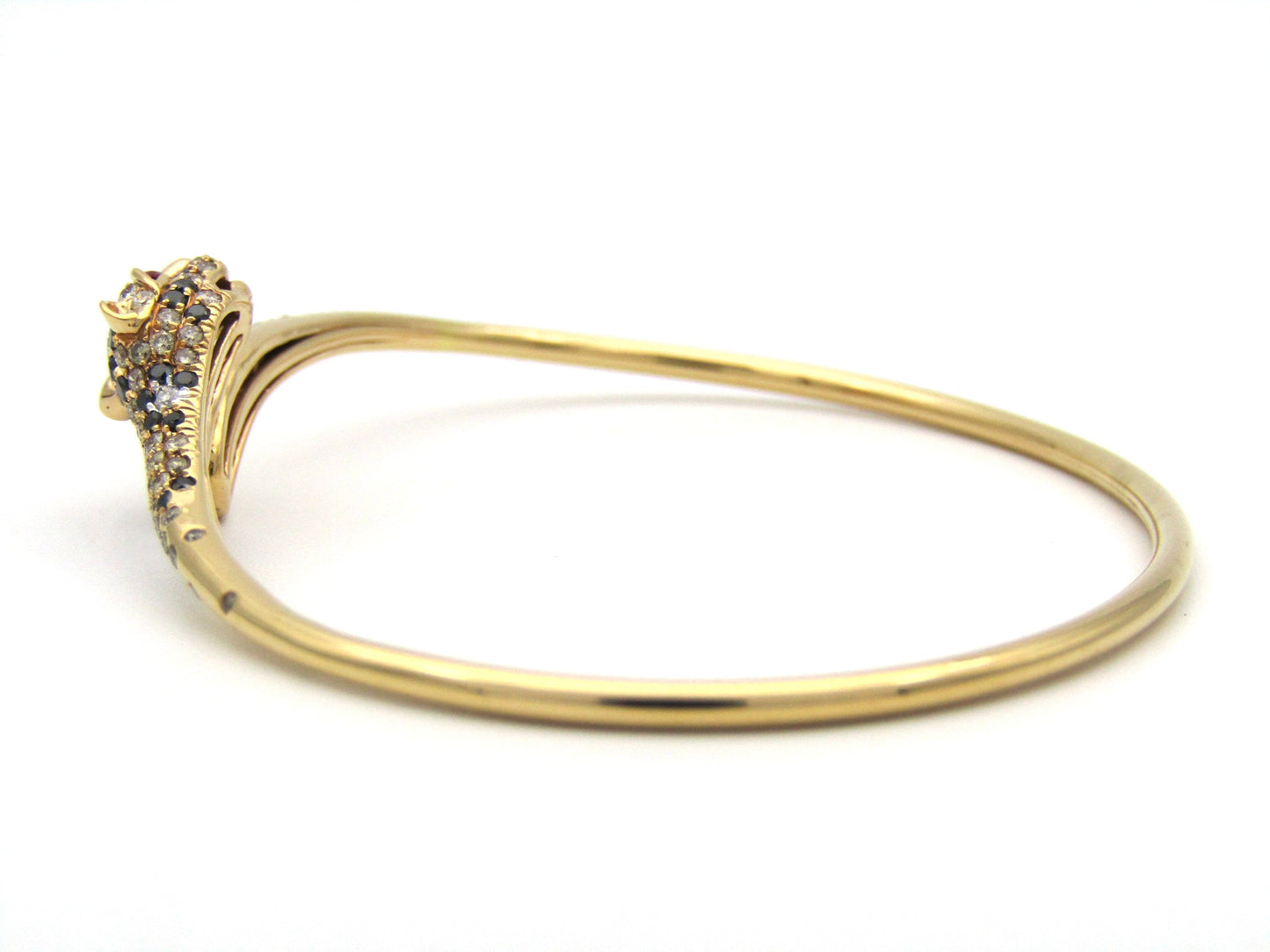 18K gold ruby and diamond leopard bangle.