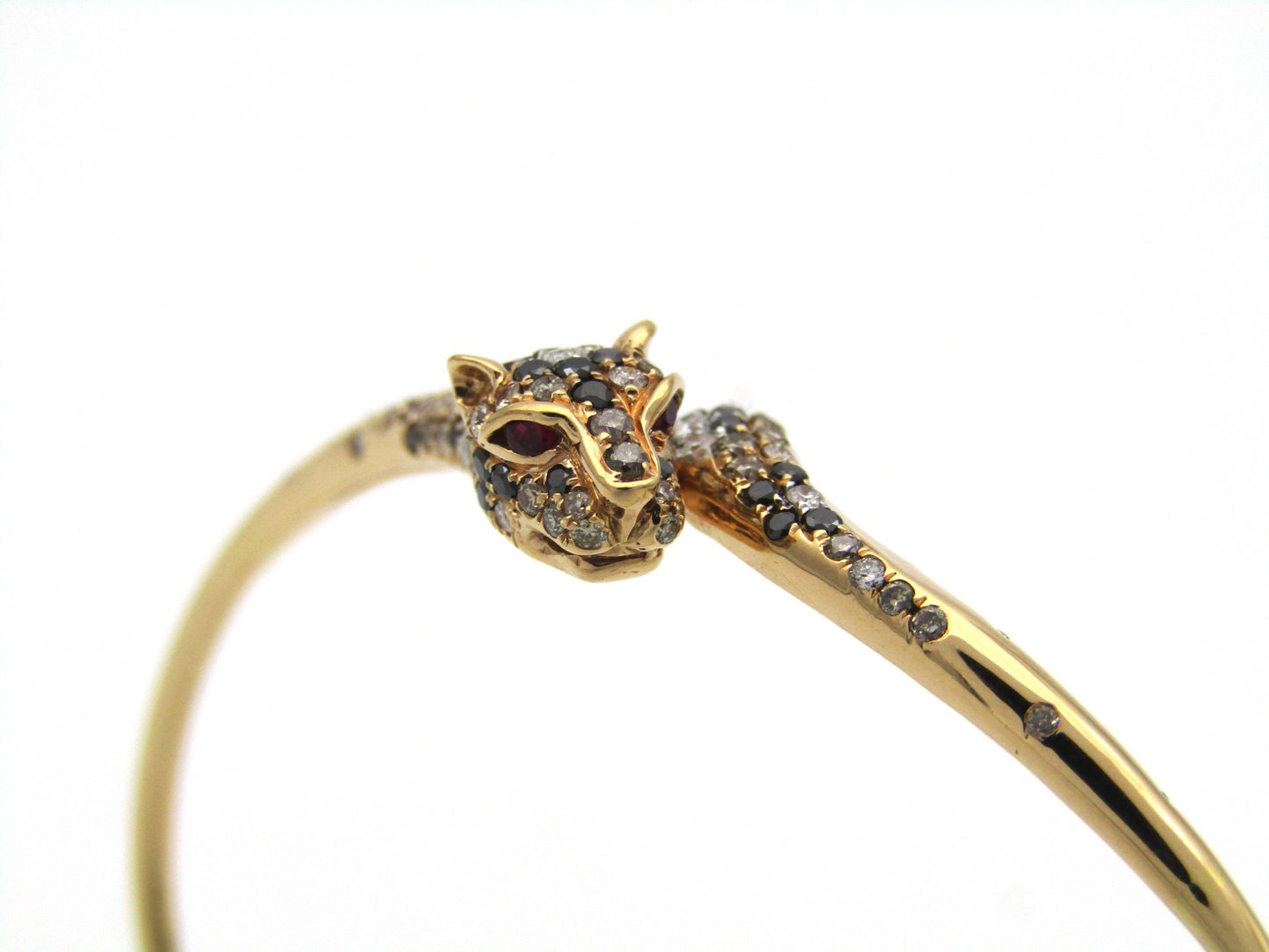 18K gold ruby and diamond leopard bangle.