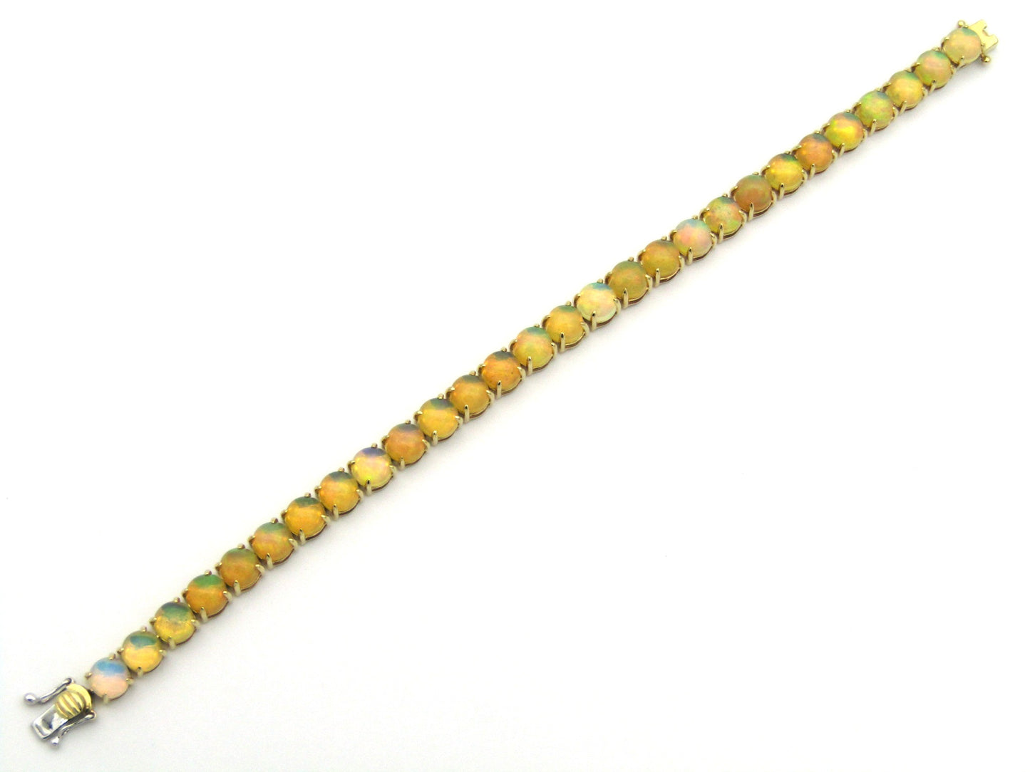 14K gold fire opal bracelet.