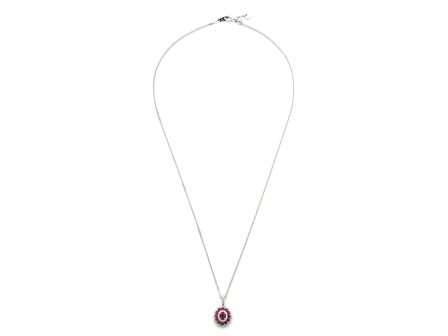 18K gold ruby and diamond pendant.