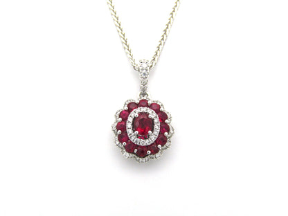 18K gold ruby and diamond pendant.