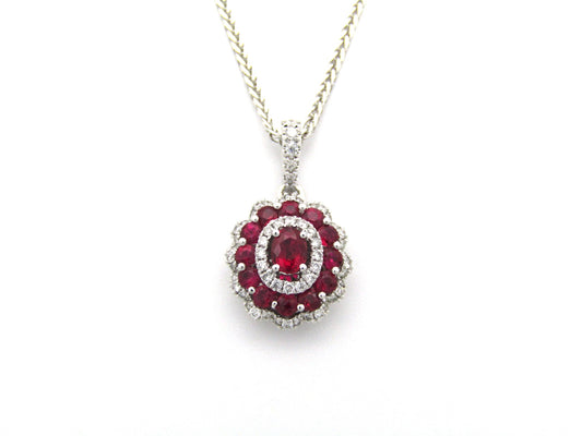 18K gold ruby and diamond pendant.