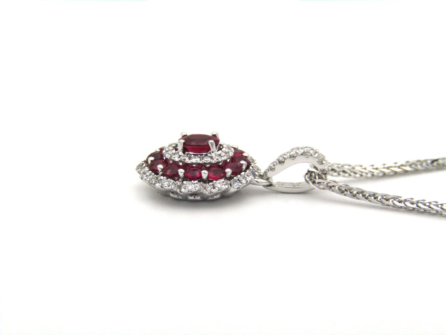 18K gold ruby and diamond pendant.
