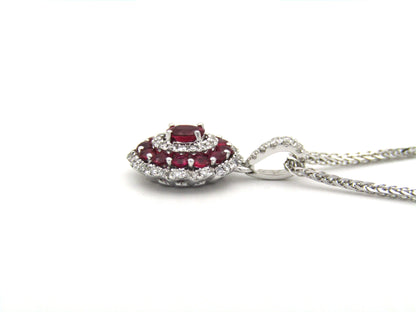 18K gold ruby and diamond pendant.