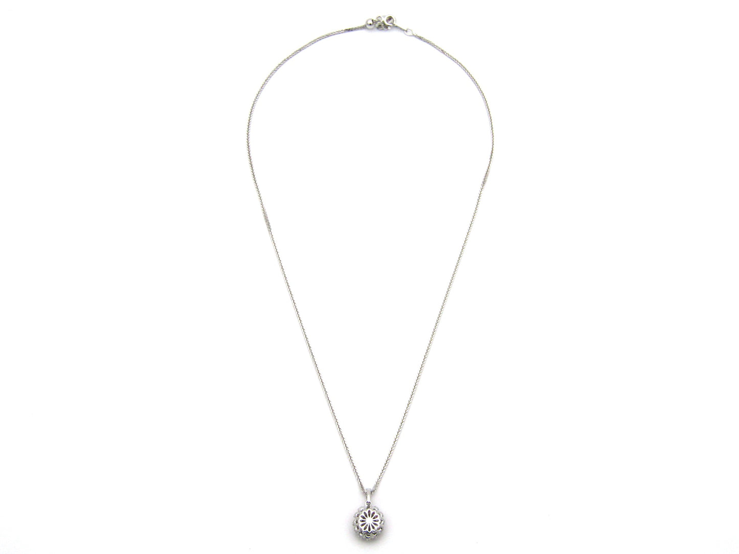 18K gold ruby and diamond pendant.