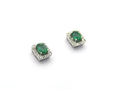 9K gold emerald and diamond earrings.