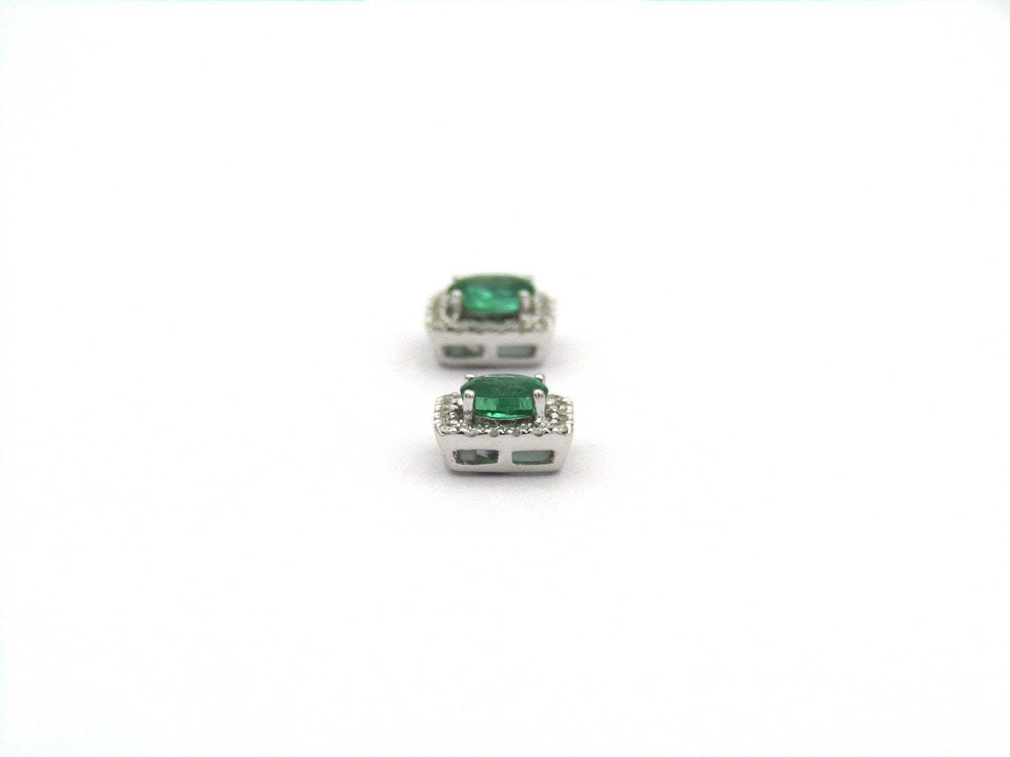 9K gold emerald and diamond earrings.