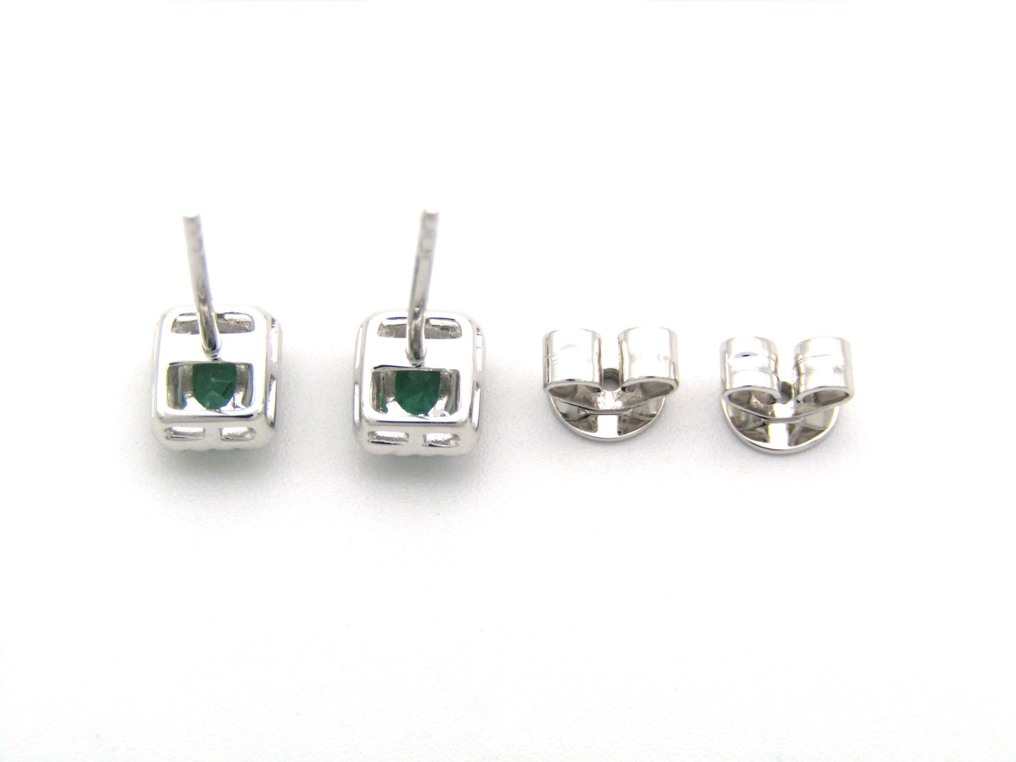 9K gold emerald and diamond earrings.