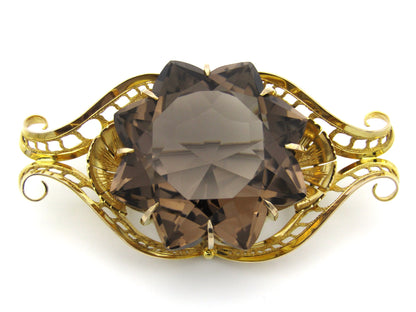 Large 9K gold smoky quartz brooch, circa 1950.