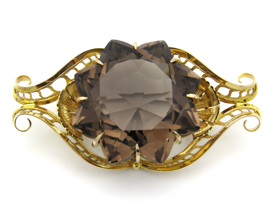 Large 9K gold smoky quartz brooch, circa 1950.