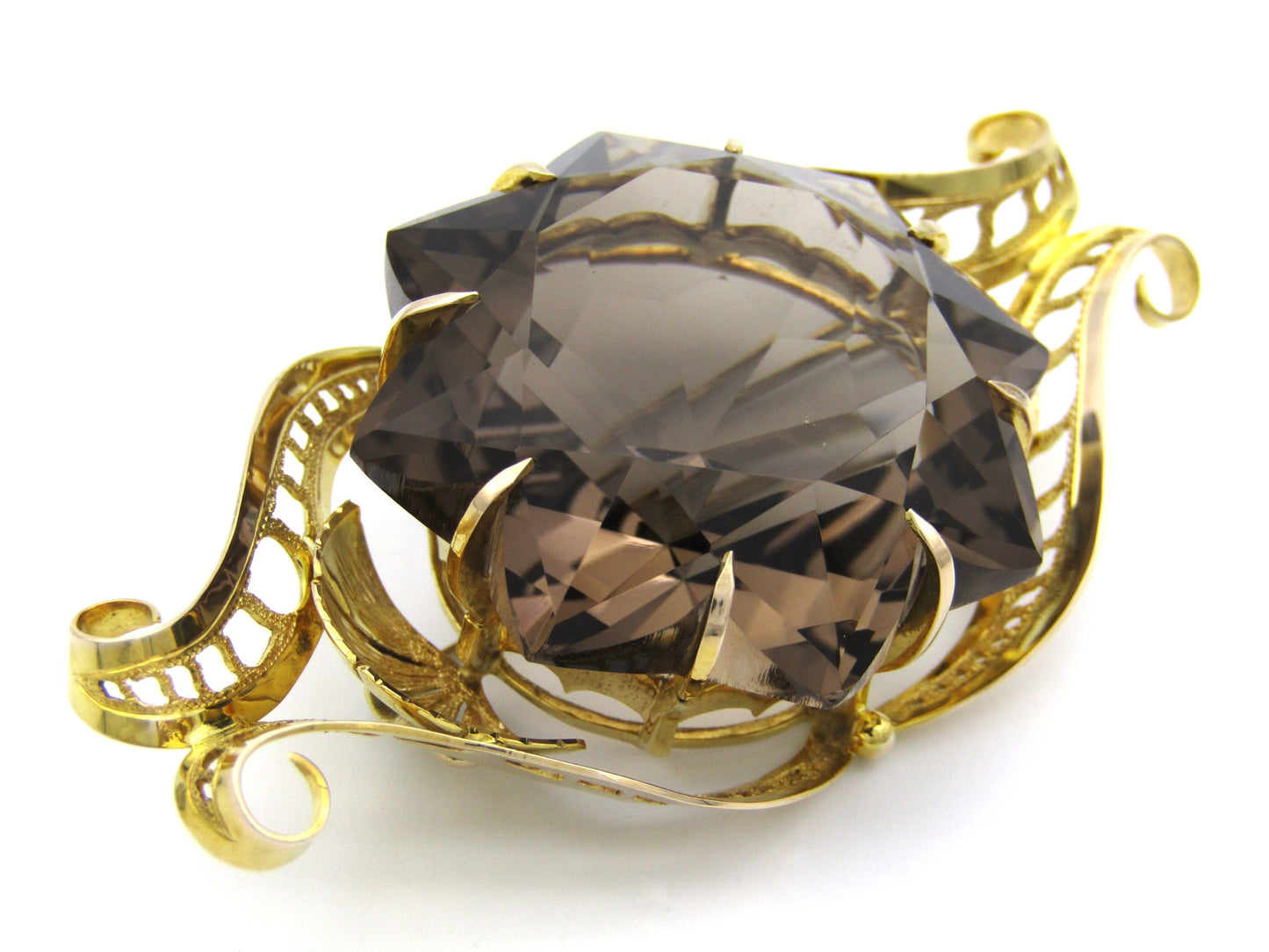 Large 9K gold smoky quartz brooch, circa 1950.