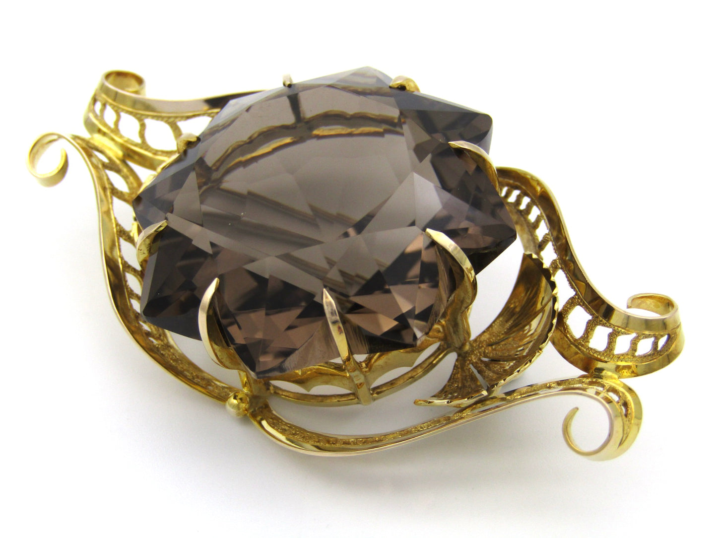 Large 9K gold smoky quartz brooch, circa 1950.
