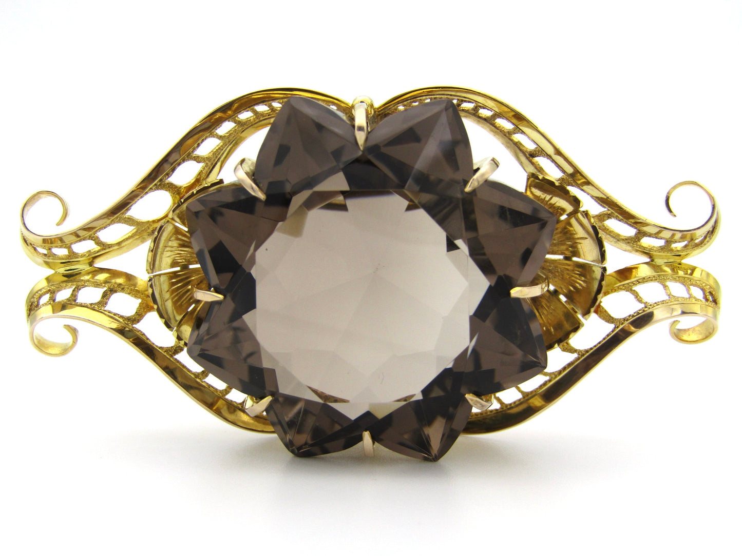 Large 9K gold smoky quartz brooch, circa 1950.