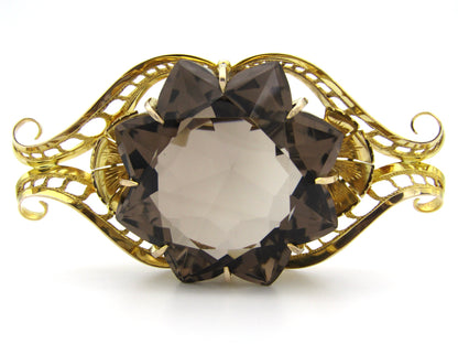 Large 9K gold smoky quartz brooch, circa 1950.