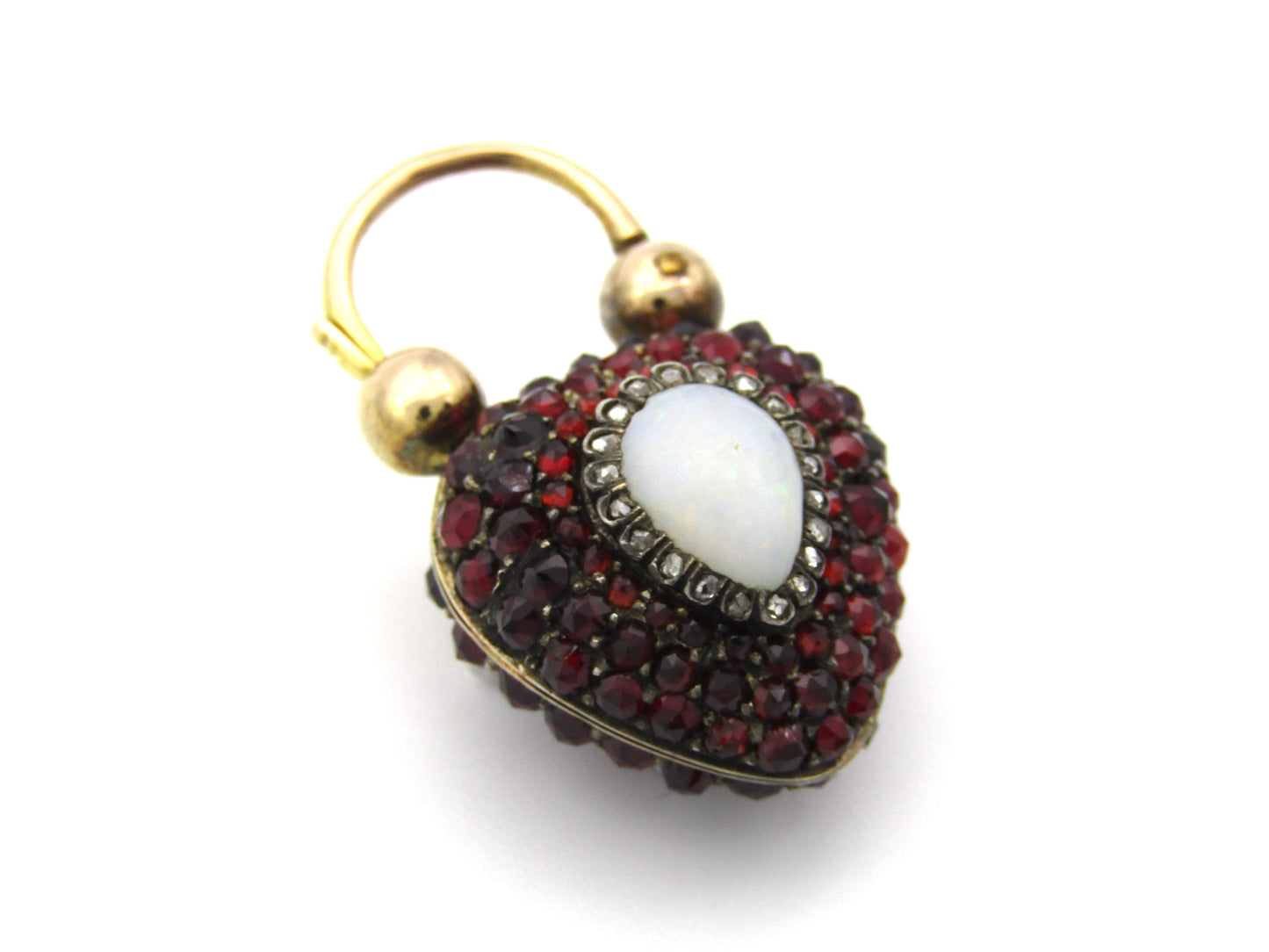 9K gold Victorian opal, garnet, seed pearl, and diamond locket and padlock clasp, circa 1850's.