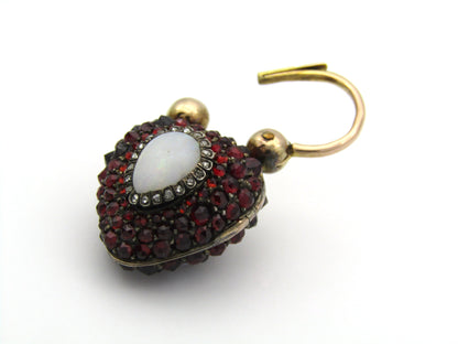 9K gold Victorian opal, garnet, seed pearl, and diamond locket and padlock clasp, circa 1850's.